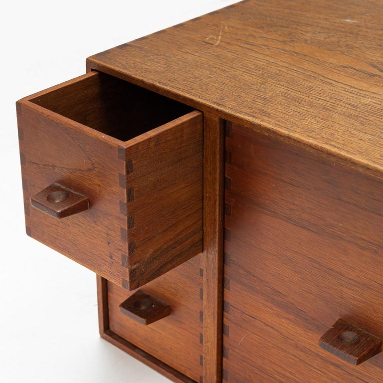 Uno & Östen Kristansson, a set of four modular cabinets from Luxus, second half of the 20th Century.
