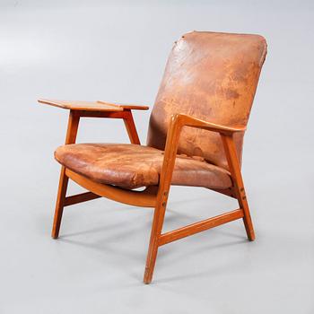 An armchair named "Contour 13", designed by Alf Svensson for Dux, made by Ljungs Industrier AB in Malmö.