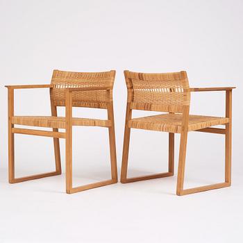 Børge Mogensen, a set of six oak and rattan 'BM61' chairs and a pair of BM62, Fredericia, Denmark, 1950s.