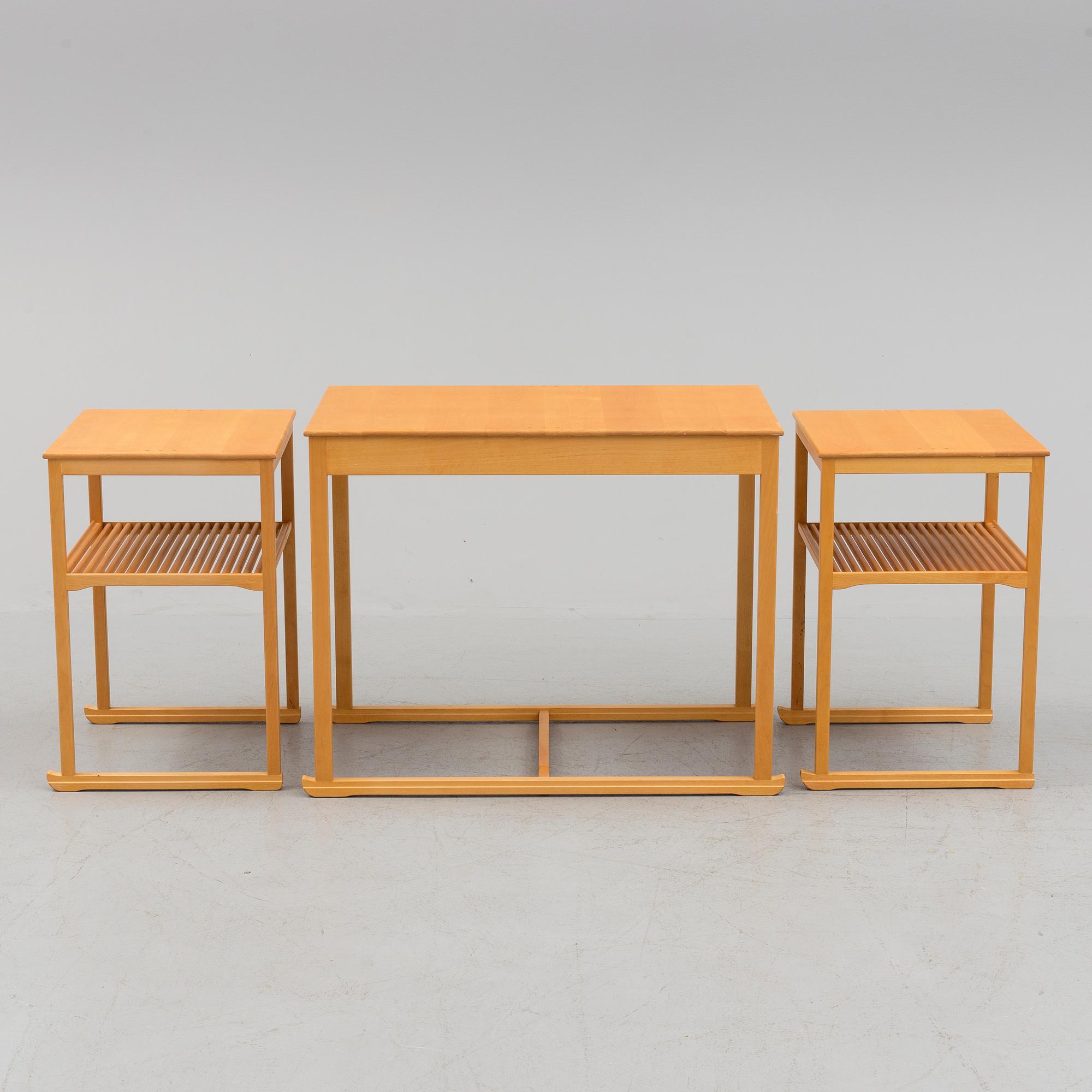 A Swedish Carl Malmsten "The Sled" birch side table nesting table i three parts, Åfors Möbelfabrik.