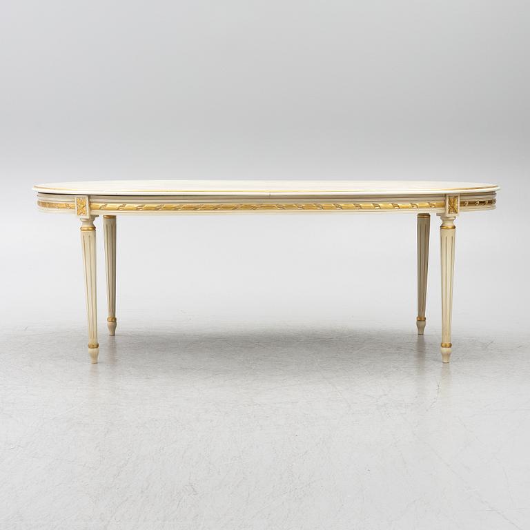 Dining table and armchair, Louis XVI style. Italy, second half of the 20th century.