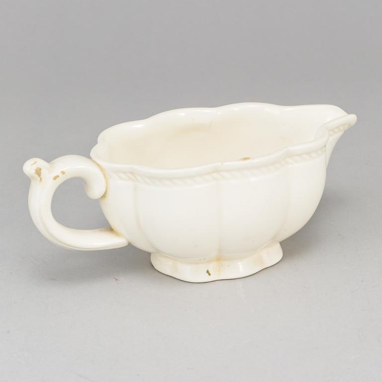 A Swedish Rörstrand creamware dish, end of 18th Century. And a white glazed creamer, probably 18th Century.