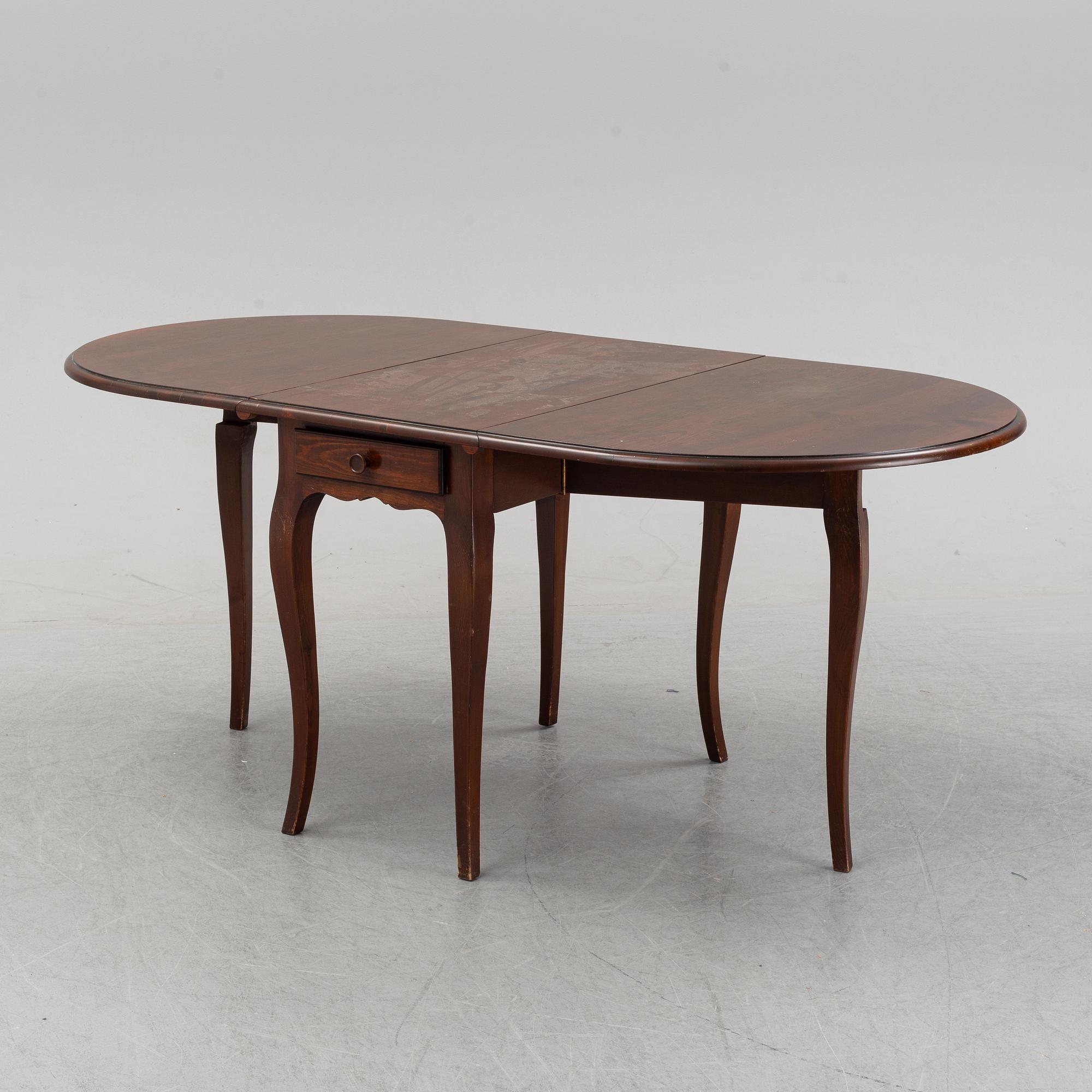 A stained pine gate-leg table, Åmells möbler.
