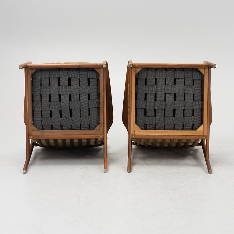 Folke Ohlsson, a pair of 'USA 75' armchairs, Dux, 1960's.