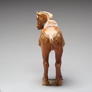 A pottery figure of a horse, Tang dynasty (618-907).