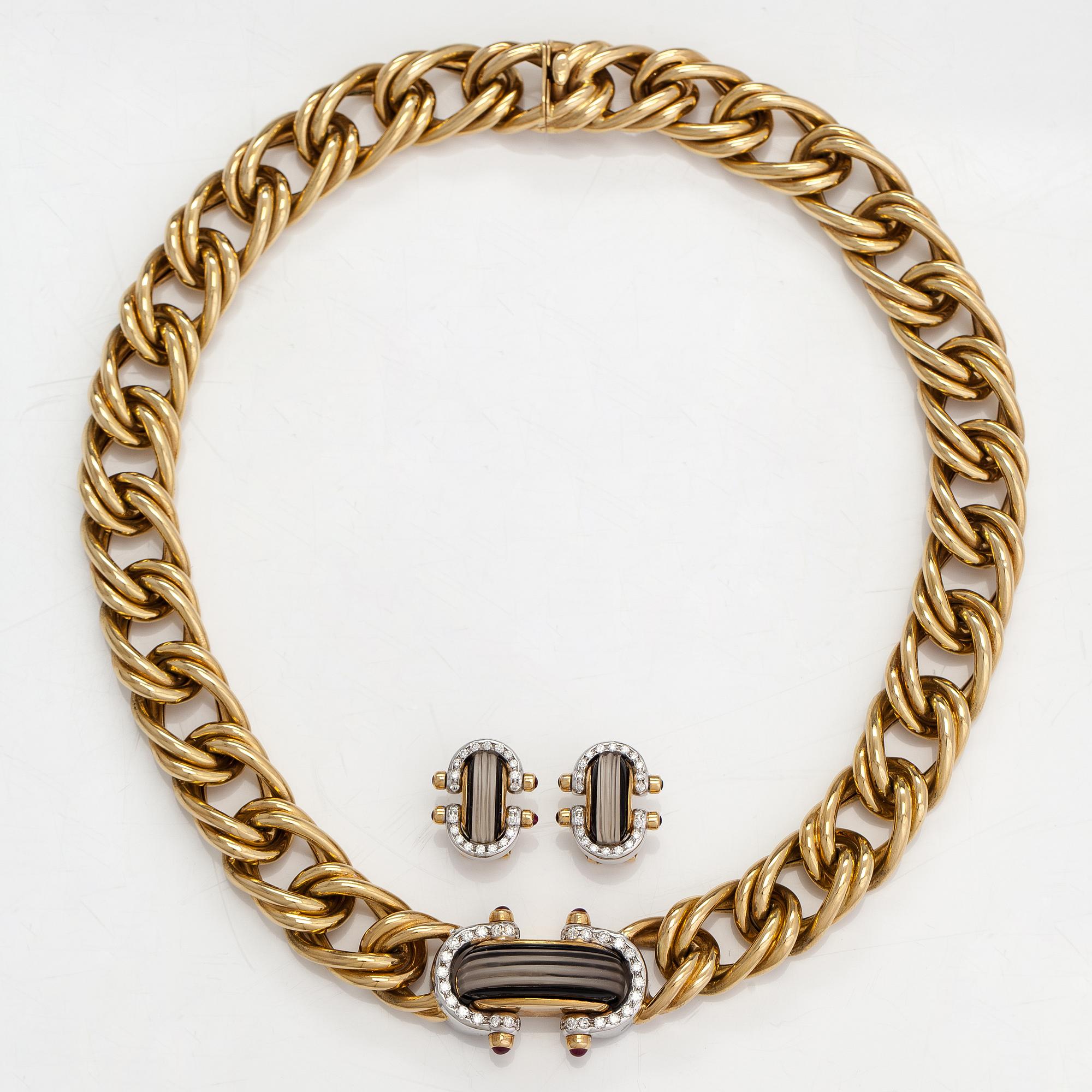 Kaulakoru ja korvkaorupari, 18K kultaa, timantteja n. 1.56 ct yht, rubiineja, onyxia ja vuorikristallia. Maxart, Italia.