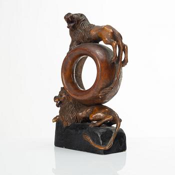 A carved pocket watch stand, Sweden, 19th century.