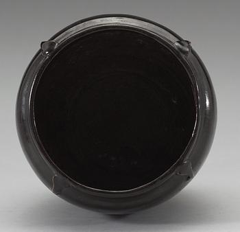 A black glazed jar, presumably Song dynasty.