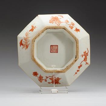 A iron red and gold Ying-Yang octagonal dish, Qing dynasty late 19th century. Whit seal mark in red.
