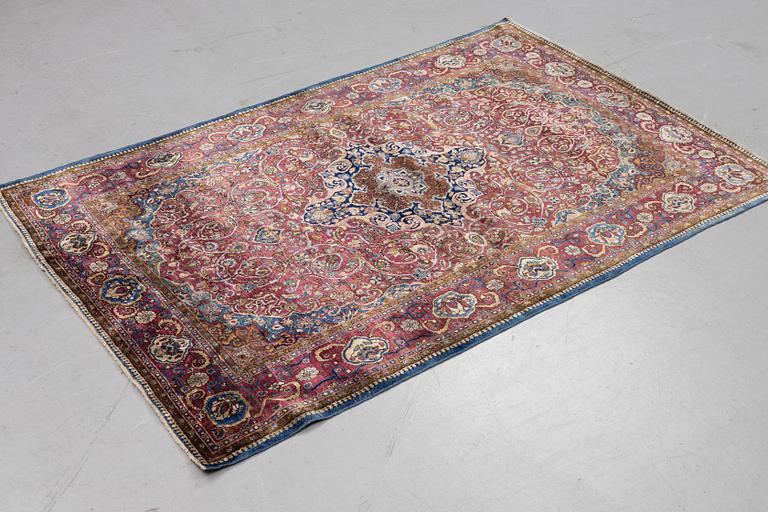 A rug, semi-antique silk Kashan, ca 194 x 127 cm.