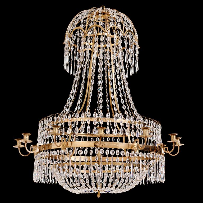 A late Gustavian gilt brass and cut glass thirteen-light chandelier, circa 1800.