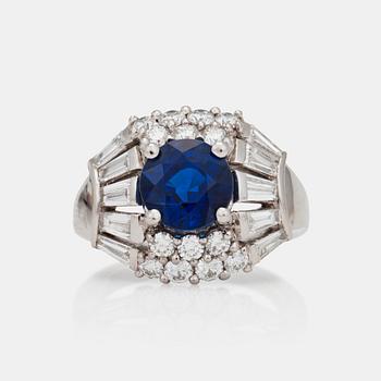 1205. An unheated 4.02 ct sapphire and diamond ring.