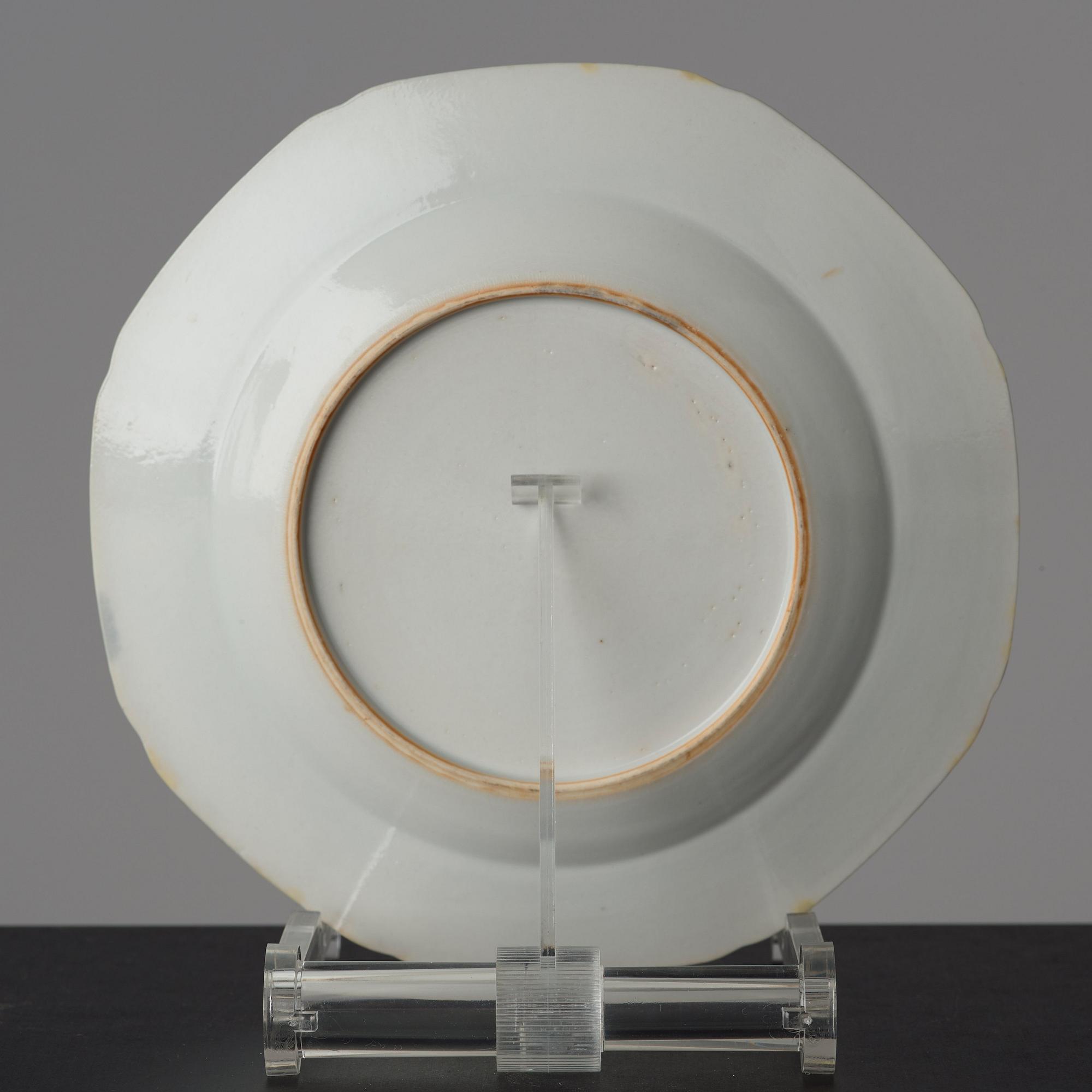 A set of 13 famille rose dessert plates, Qing dynasty, late 18th Century.