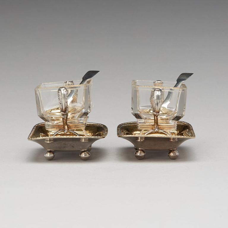 A pair of Swedish 19th century parcel-gilt silver and glass jelly-bowls, mark of Carl Tengstedt, Gothenburg 1839.