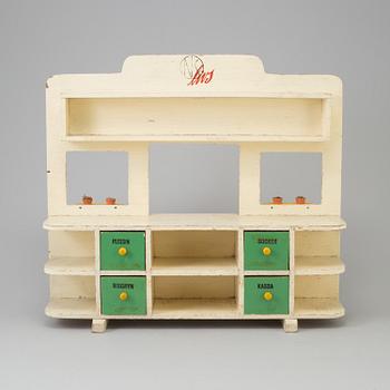 LEKSAK, i form av affär med logotyp för NK livs, 1930-/40-tal.