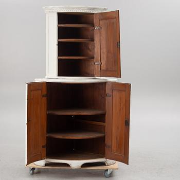 A two-part corner cabinet, 19th century.