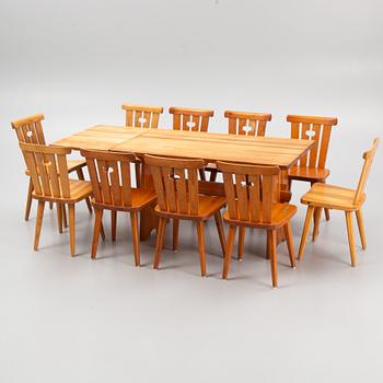 A set of ten chairs and a table, mid 20th Century.