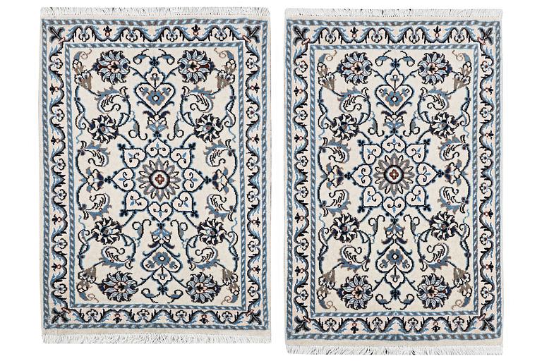 A pair of bedside rugs, Nain, part silk, c. 90 x 60 cm & ca. 87 x 62 cm.