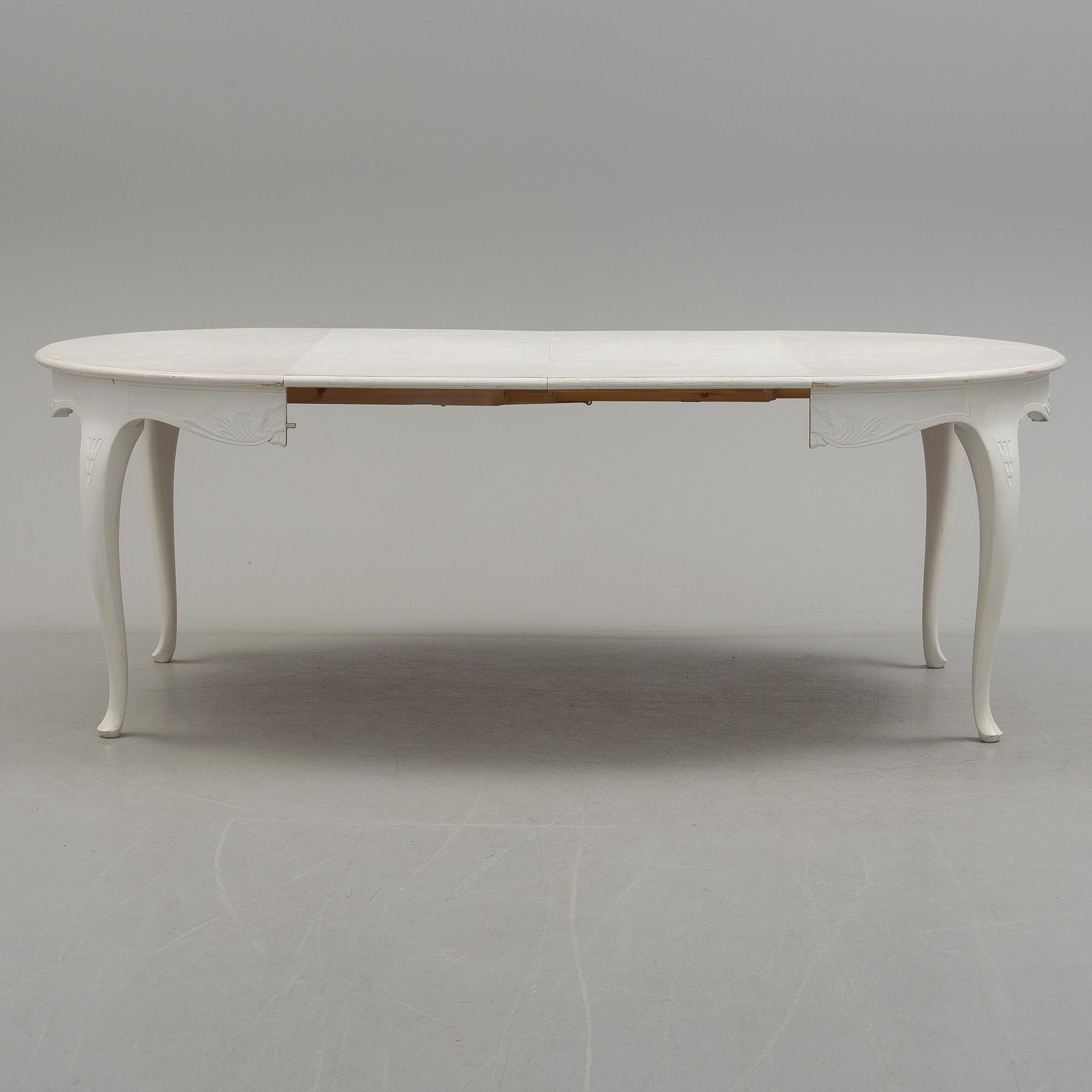 a rococo-style dining table from the 20th century.