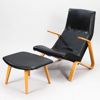 EERO SAARINEN, fåtölj samt fotpall, "Grasshopper", licenstillverkad av Tetrimäki Finland.