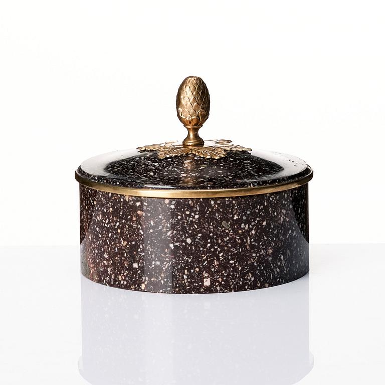 A Swedish Empire porphyry butter box with cover, 19th century.