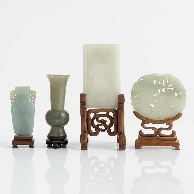 A group of four Chinese sculptured nephrite objects, 20th Century.