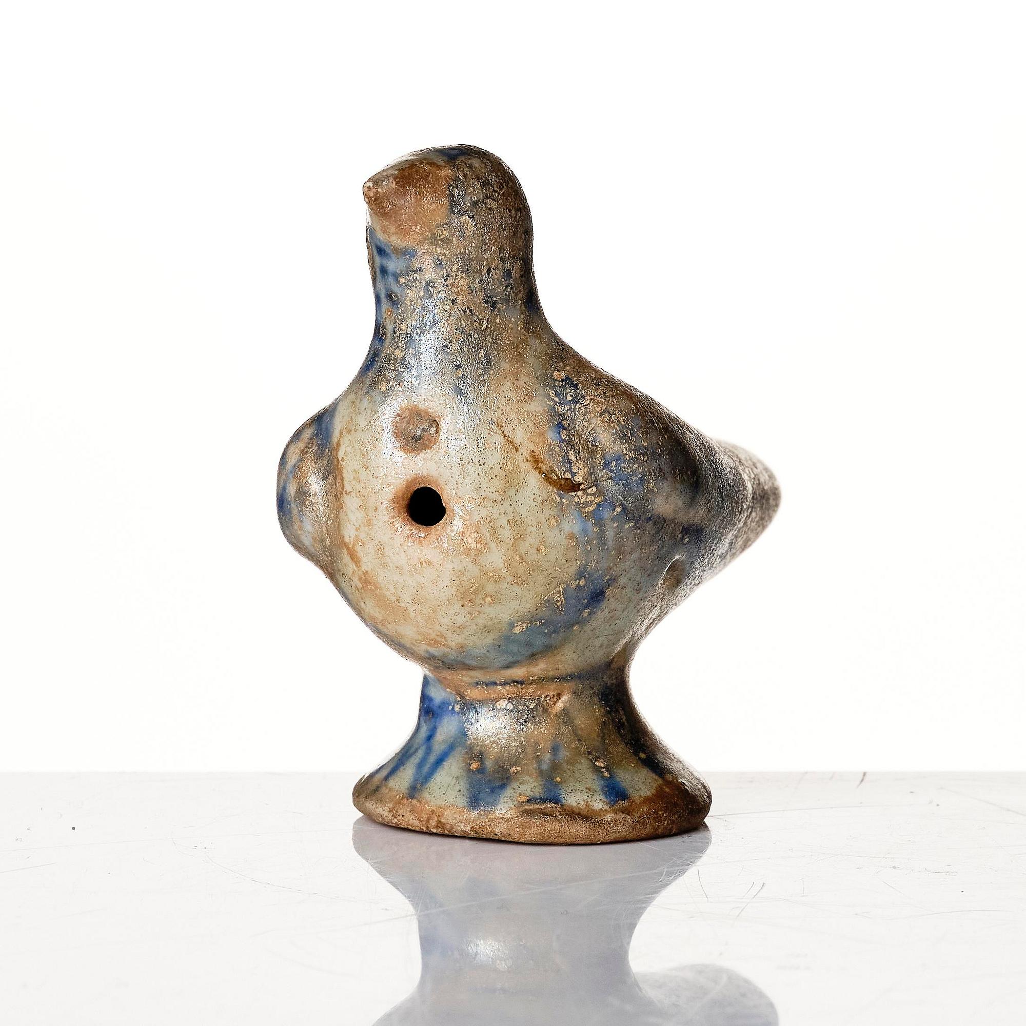 A blue and white glazed ceramic bird, probably Kashan, Persia (Iran) 12th /13th century.