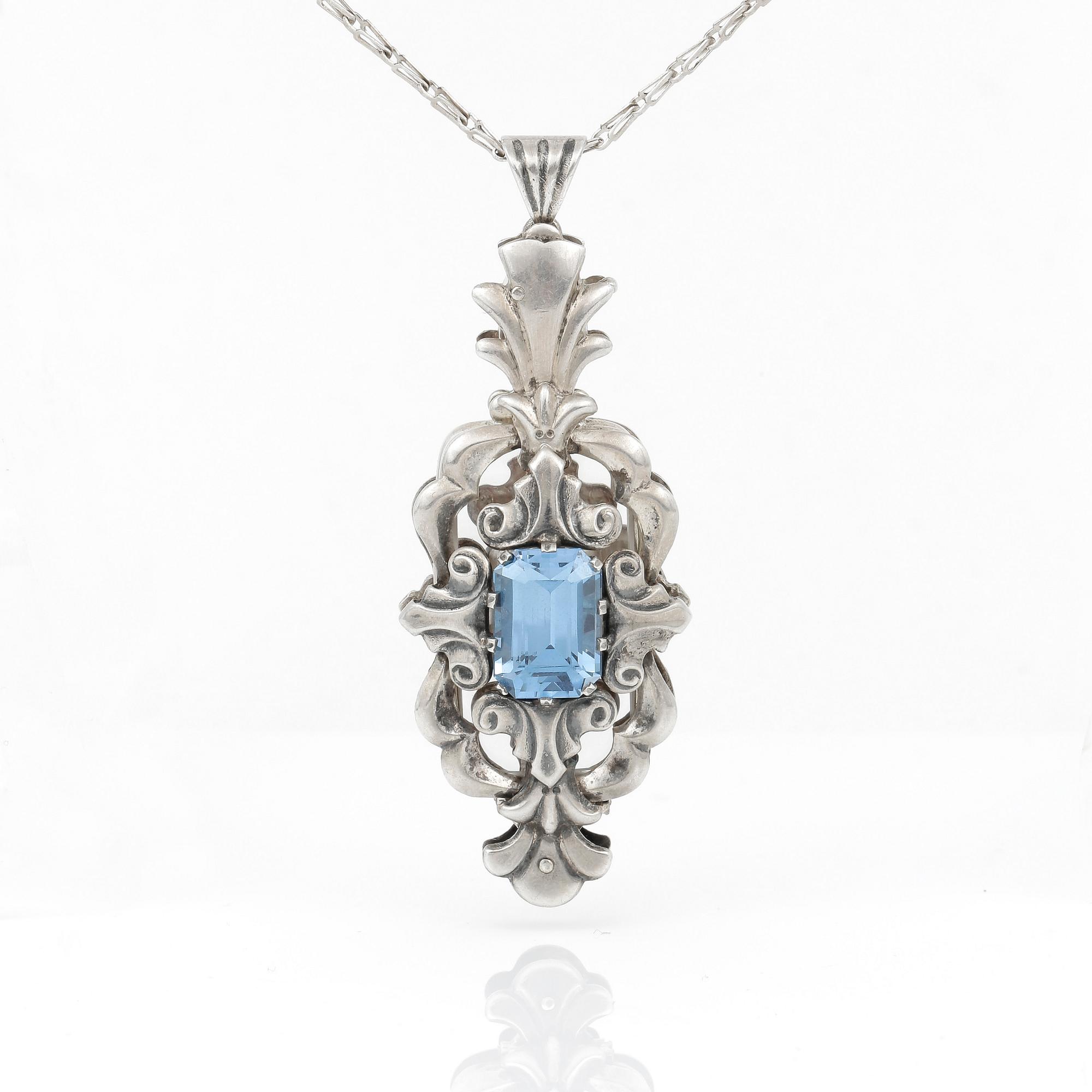 LORNJETT samt KEDJA, silver med blå spinell ca 9,69 ct, Viktor Jansson, Lindesberg, 1948.