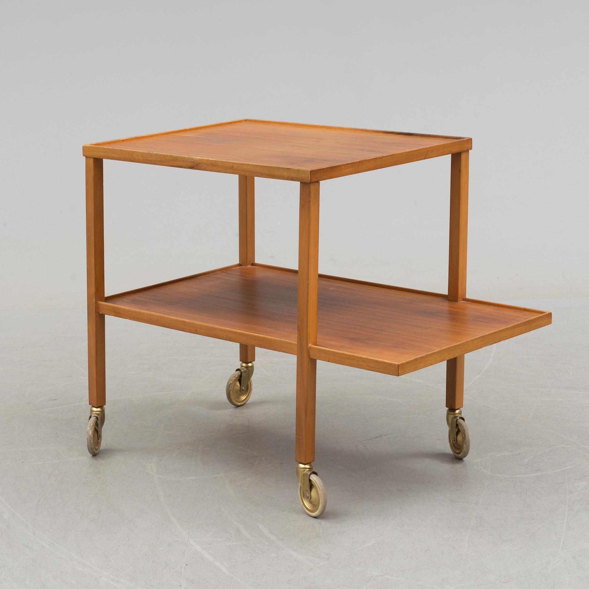 A walnut tea trolley model 470 by Josef Frank for Firma Svenskt Tenn.
