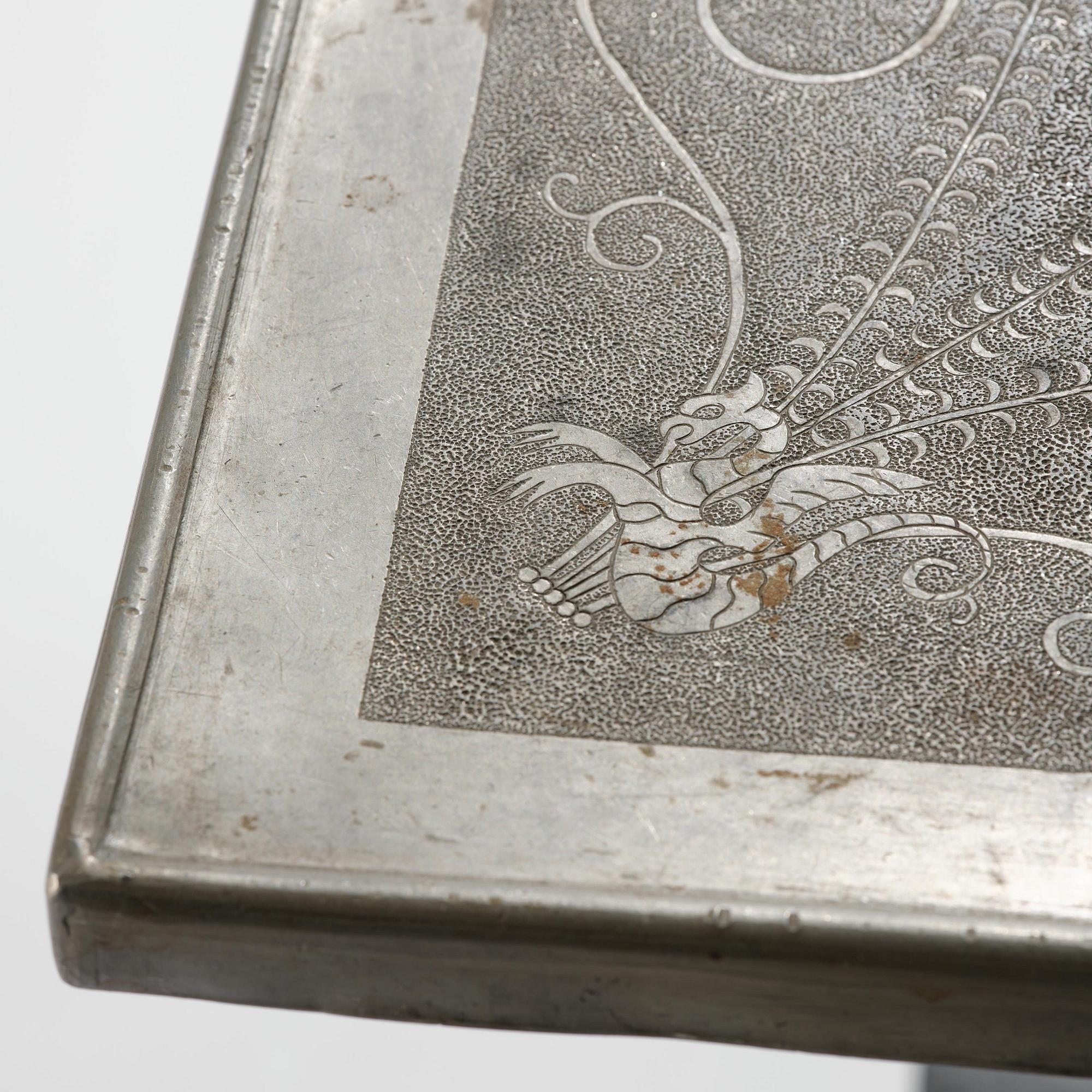 Anna Petrus, a pewter top tray table on a base by Uno Åhrén, executed in her studio, Stockholm, ca 1922-25.