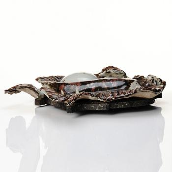 Gösta Grähs, a stoneware wall sculpture of a fish, Arboga, Sweden.