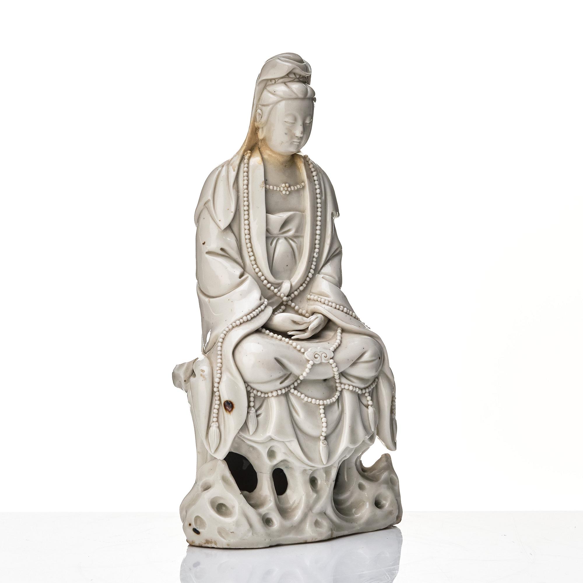 A Chinese blanc de chine figure of Guanyin, Qing dynasty, 18th Century.