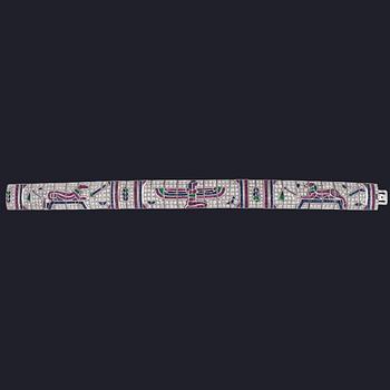 ARMBAND, carréslipade rubiner, safirer, smaragder samt briljantslipade diamanter, tot. ca 5 ct, egyptiskt motiv.