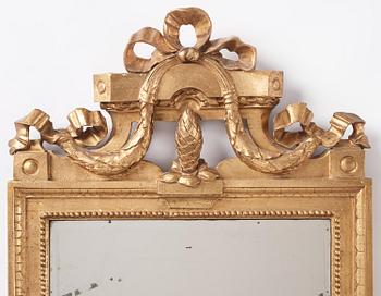 A Gustavian giltwood mirror by C. G. Fyrwald (master in Stockholm 1776-1825).