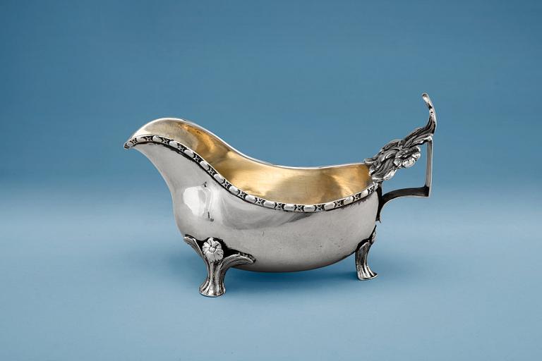 A CREAMER, silver, rococo. Petter Eneroth Stockholm 1783. Gilt inside. Length 17 cm, weight 217 g.