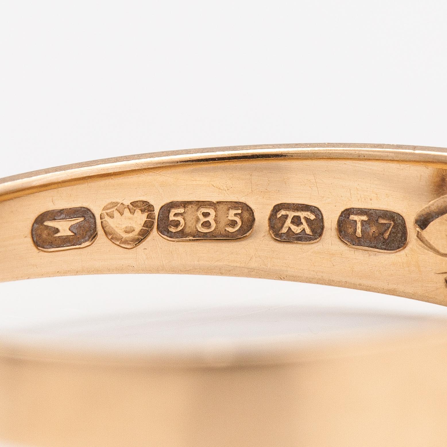 Elis Kauppi, A 14K gold ring with a ca. 0.01 ct diamond. Kupittaan kulta, Turku 1972.