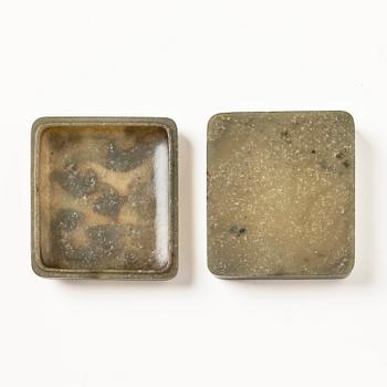 A well carved green stone box with cover, China, 20th century.