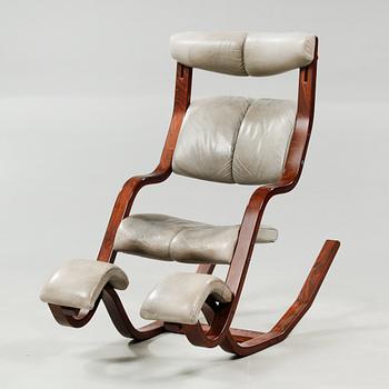 A "Gravity Balans" rocking chair, deisgned by Peter Opsvik, model launched 1983.