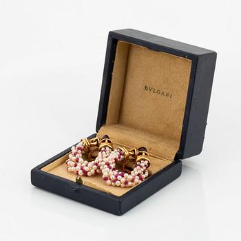 A pair of Bulgari 18K gold earrings with sugarloaf-cut rubelites and cultured pearls and ruby beads.