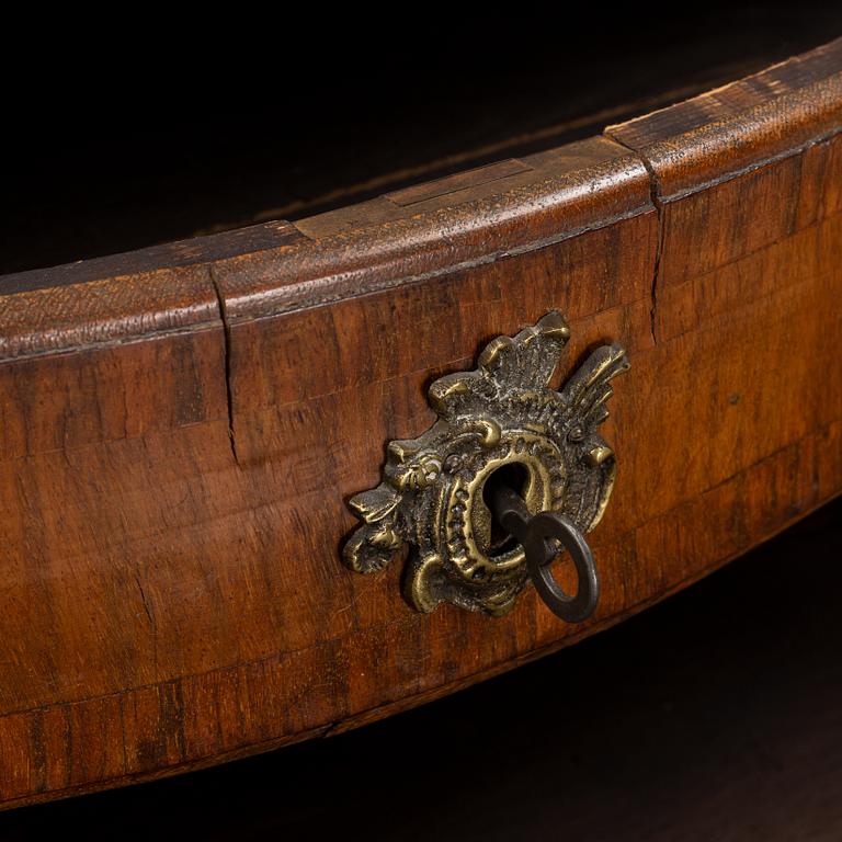 A 19th Century rococo style chest of drawers.