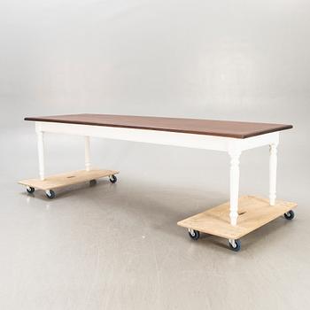 A painted and stained table 21st century.