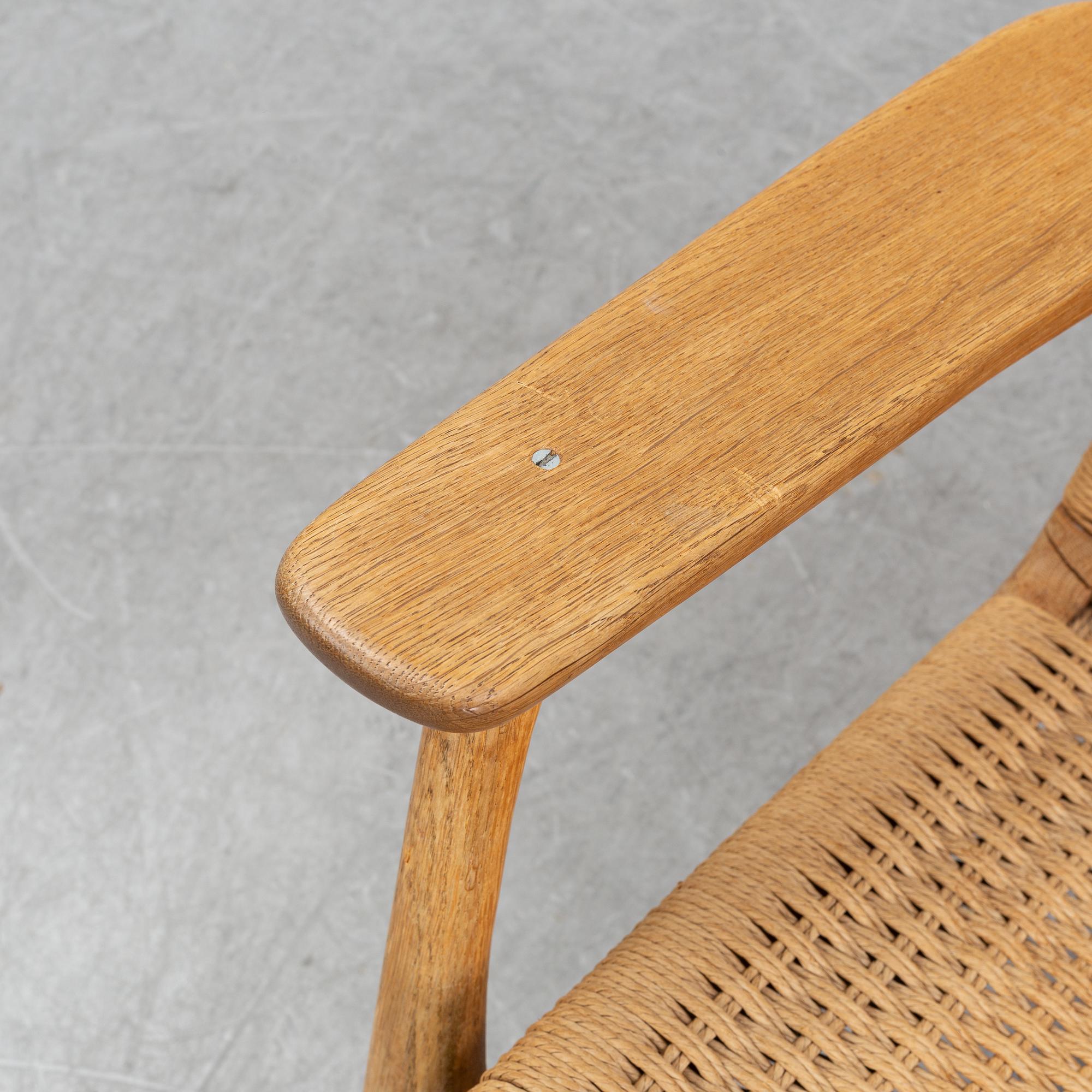 A 'CH-25' armchair designed by Hans J Wegner for Carl Hansen & Søn, Denmark.