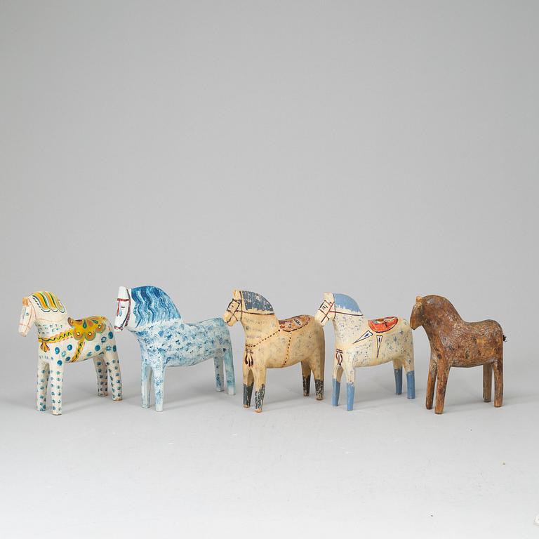 5 painted Swedish wooden horse from the 20th century.