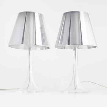 Philippe Starck, a pair of 'Miss K' table lamps, Flos, Italy.