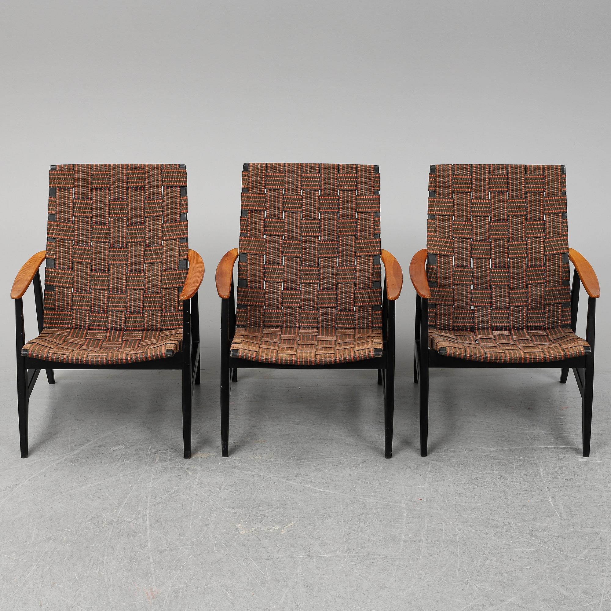 A set of three 1950's easy chairs.