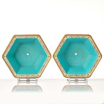 A pair of famille rose flower pots with stands, probably Republic, China, 20th Century.