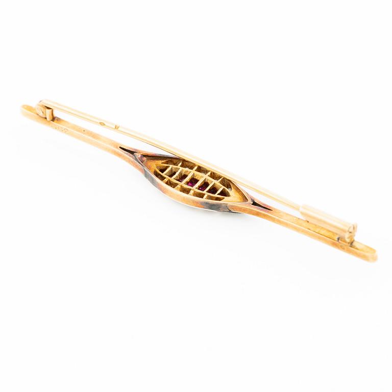 Brooch, 18K gold set with rose-cut diamonds and rubies.