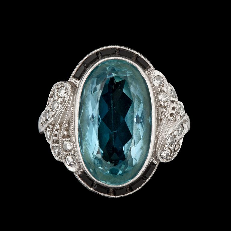 An aquamarine and onyx ring.