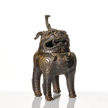 A bronze censer in the shape of a buddhist lion, Ming dynasty (1368-1644).