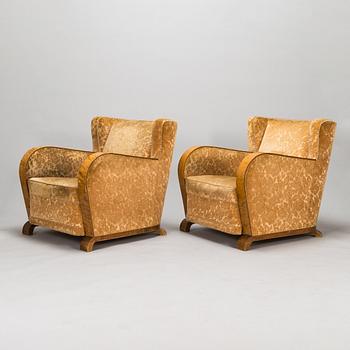 A pair of 1930's armchairs.